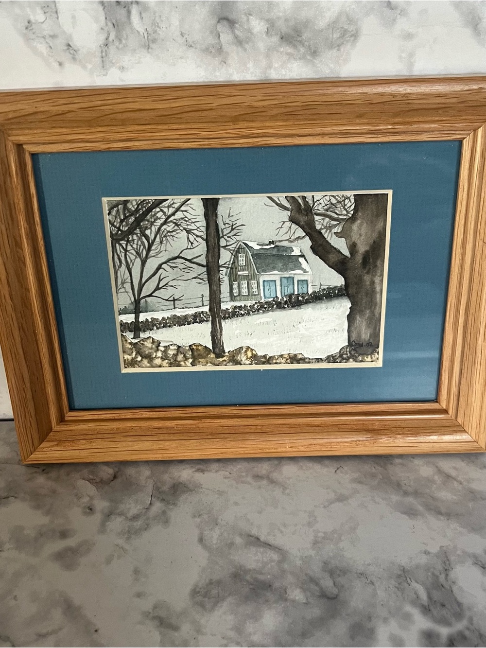 Framed Winter Cottage Watercolor with Blue Mat